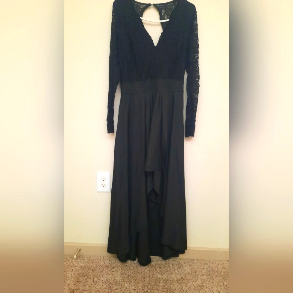 Black party woman's dress with lace in the sleeves size small asymmetrical